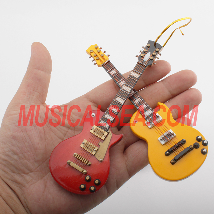 Miniature red wooden electric guitar model ne